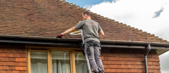 our team cleaning the gutters on a house in Stoke Bishop, Buckinghamshire